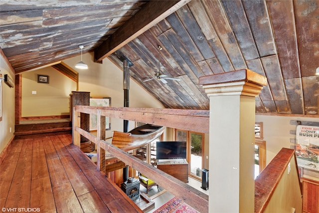 588 Ranch Rd, Bigfork, MT 59911 - stairway with a ceiling fan, hardwood / wood-style floors, and lofted ceiling