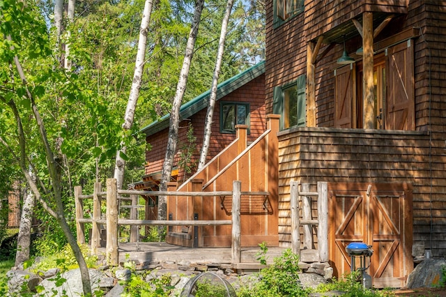588 Ranch Rd, Bigfork, MT 59911 - view of home's exterior featuring a wooden deck