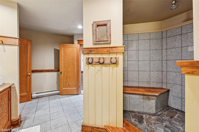 588 Ranch Rd, Bigfork, MT 59911 - bathroom with a baseboard heating unit, granite floors, and recessed lighting