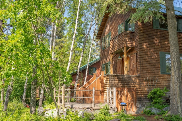 view of home's exterior with stairs