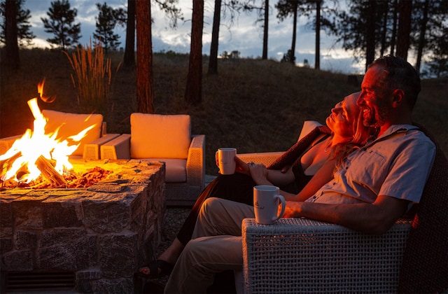 1615 Wilderness Club Dr, Eureka, MT 59917 - view of patio with a fire pit