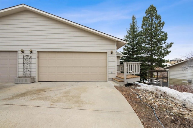 garage featuring driveway