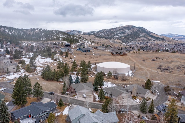 birds eye view of property featuring a mountain view and a residential view