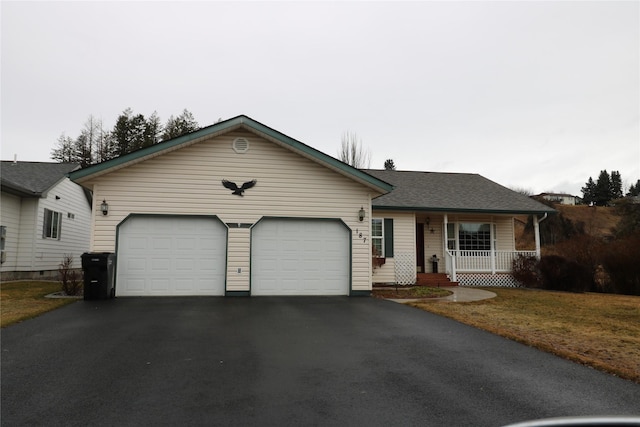 ranch-style house with driveway, a porch, an attached garage, and a shingled roof