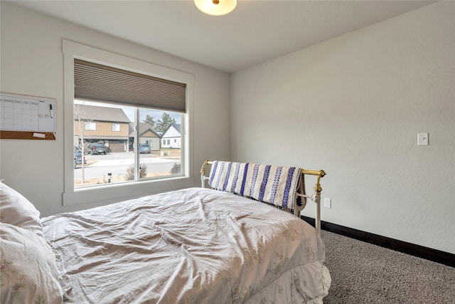 bedroom featuring baseboards