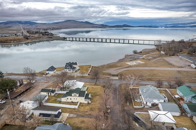 bird's eye view with a water and mountain view