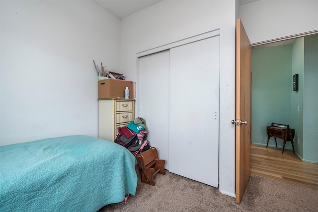 bedroom featuring a closet and carpet