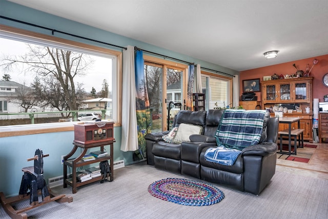 living room featuring baseboards