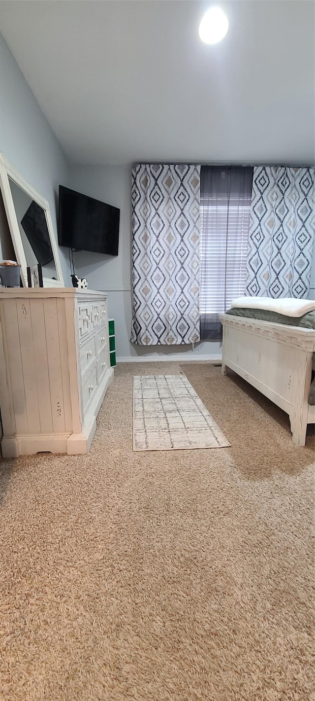 unfurnished bedroom with carpet