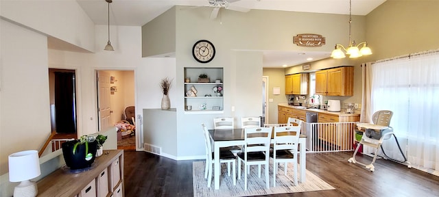 dining space featuring visible vents, high vaulted ceiling, a ceiling fan, dark wood finished floors, and baseboards