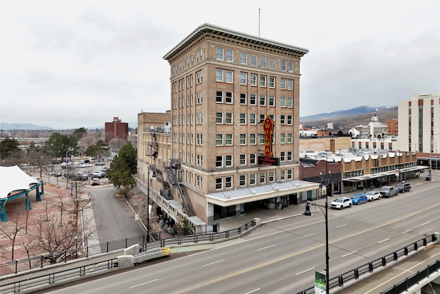 view of property with a city view and a mountain view