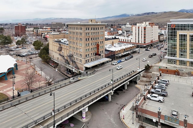 property's view of city featuring a mountain view