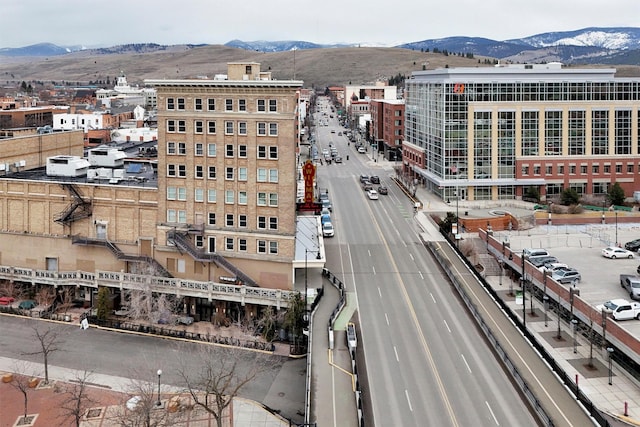 birds eye view of property featuring a mountain view