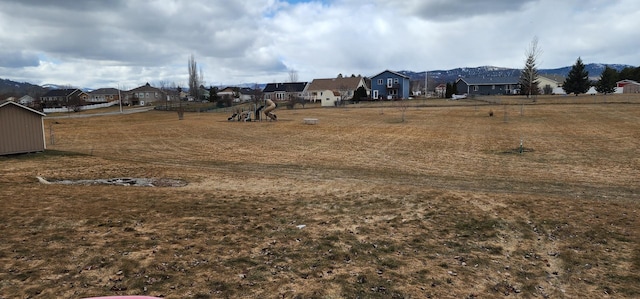 view of yard with a residential view