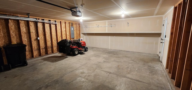 garage with electric panel and a garage door opener