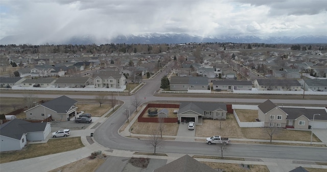 birds eye view of property with a residential view and a mountain view