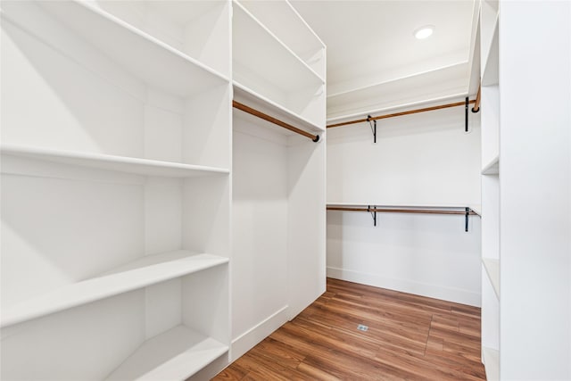 spacious closet with wood finished floors