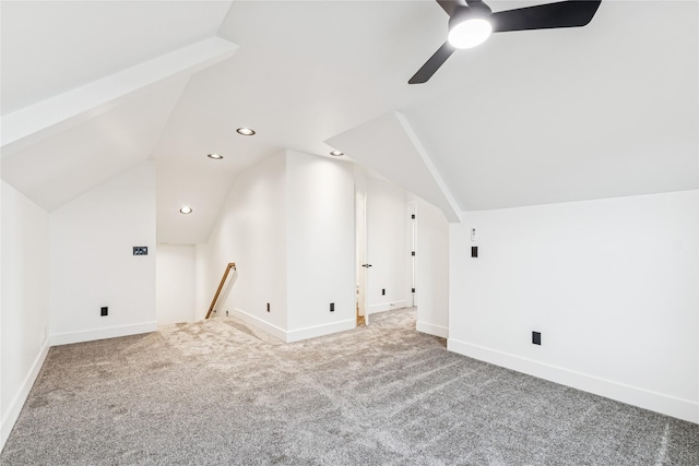 bonus room featuring carpet floors, baseboards, a ceiling fan, and vaulted ceiling