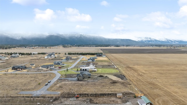 birds eye view of property featuring a rural view and a mountain view