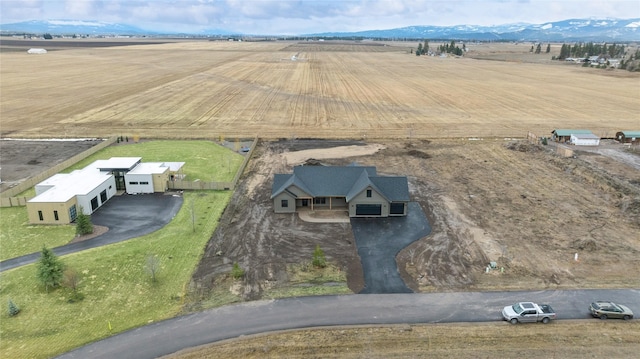 aerial view with a rural view and a mountain view