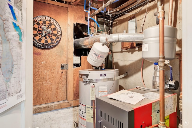 utility room featuring water heater