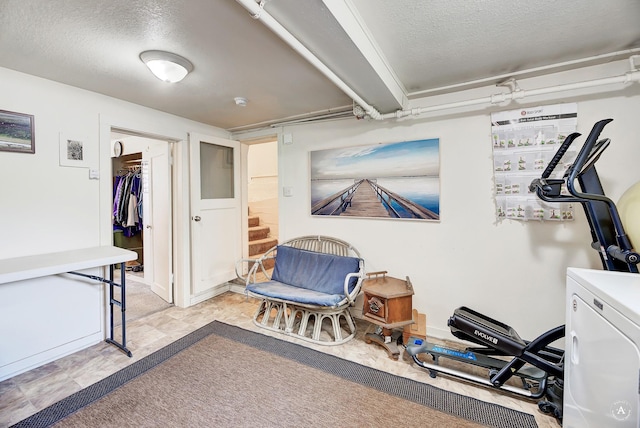 interior space with a textured ceiling