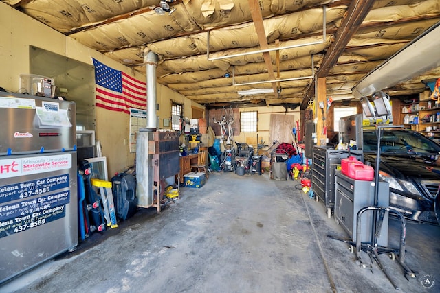 garage with a workshop area