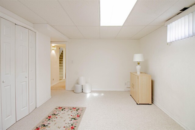 3790 Continental Dr, Butte, MT 59701 - basement with baseboards, stairs, carpet flooring, and a drop ceiling