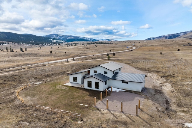 aerial view featuring a rural view and a mountain view