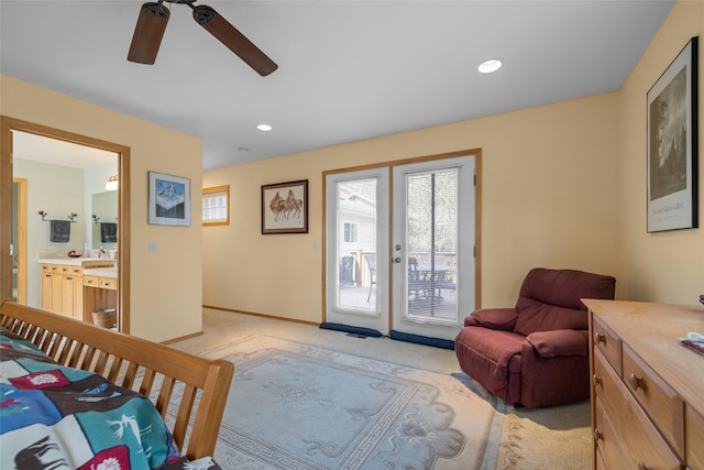 bedroom with light carpet, access to outside, recessed lighting, connected bathroom, and baseboards