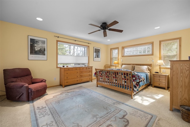 bedroom featuring recessed lighting, baseboards, carpet, and a ceiling fan