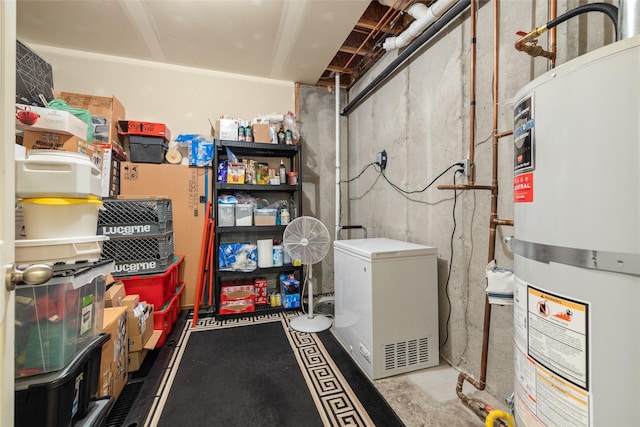 interior space featuring water heater and refrigerator