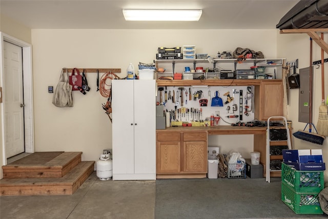 garage with a workshop area