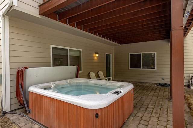 view of patio / terrace featuring a hot tub