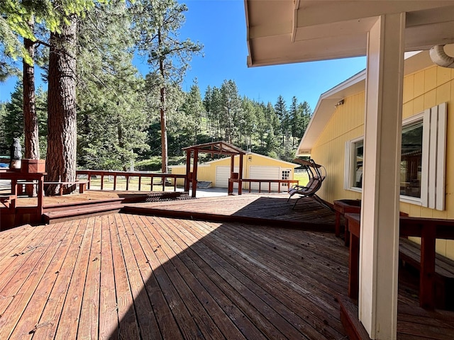 wooden deck with an outdoor structure