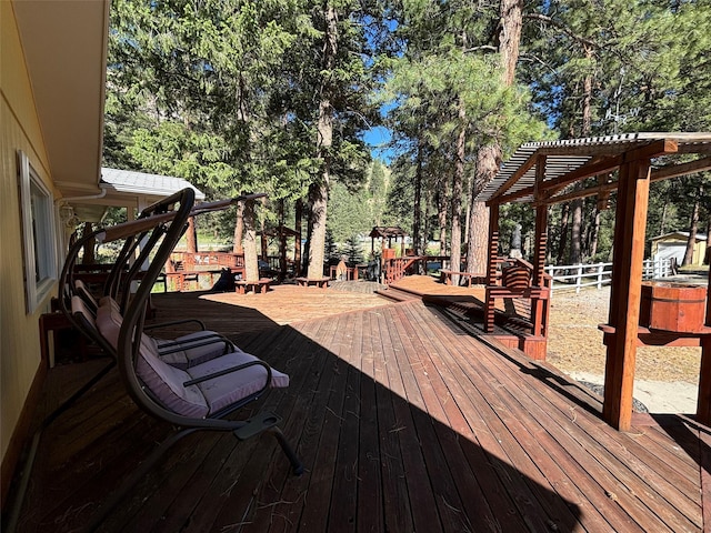 deck featuring a pergola