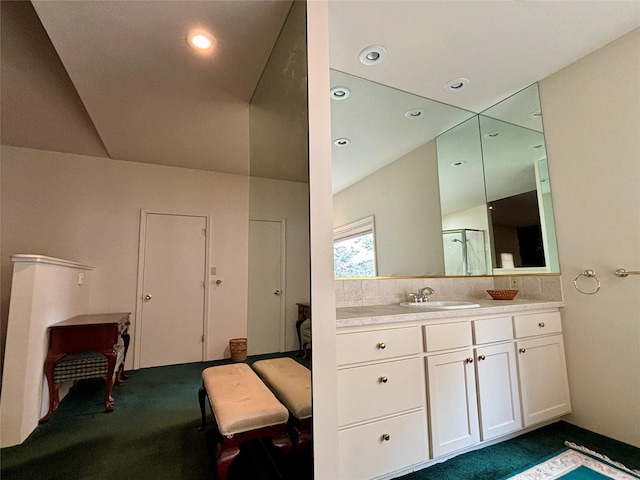 full bathroom with decorative backsplash, recessed lighting, vanity, and a shower