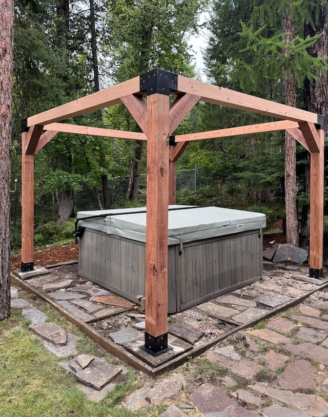 view of patio / terrace featuring a hot tub