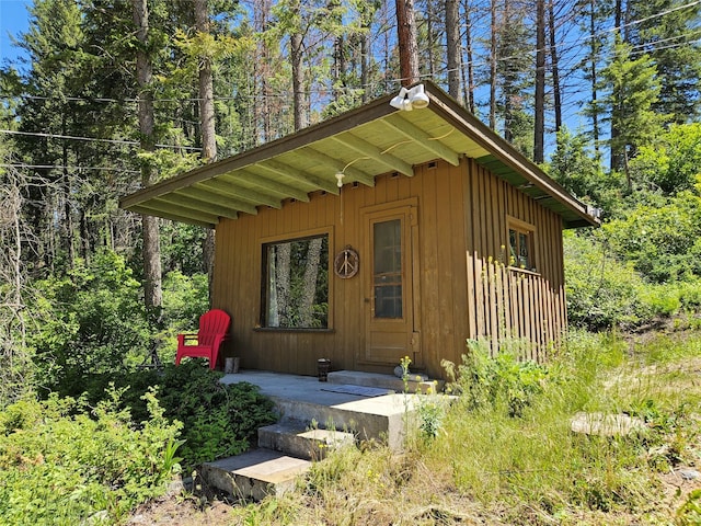 view of outbuilding featuring an outdoor structure