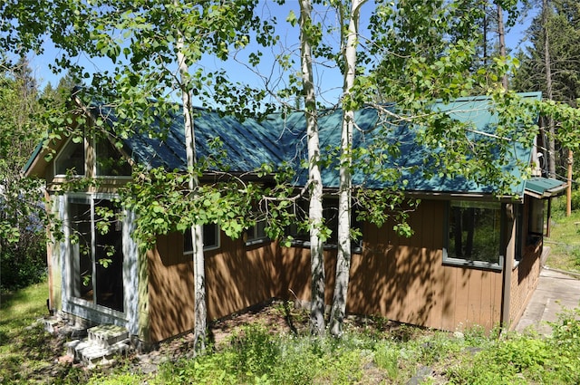 31611 Holmes Creek Ln, Polson, MT 59860 - view of property exterior with a shingled roof