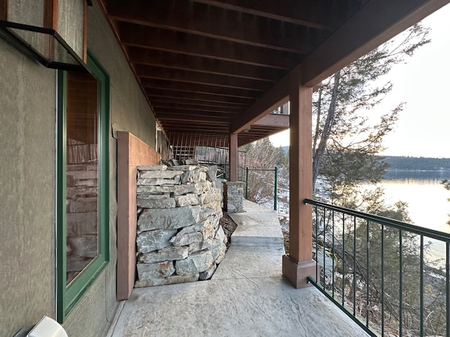 view of patio featuring a balcony