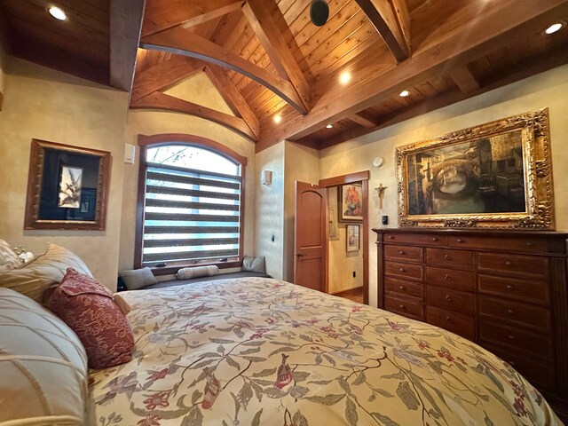 bedroom featuring vaulted ceiling with beams and wood ceiling