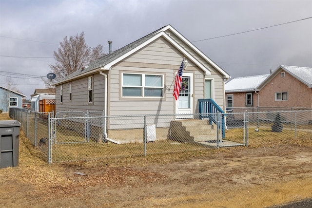 view of front facade featuring a gate and fence