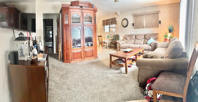 living area featuring carpet flooring