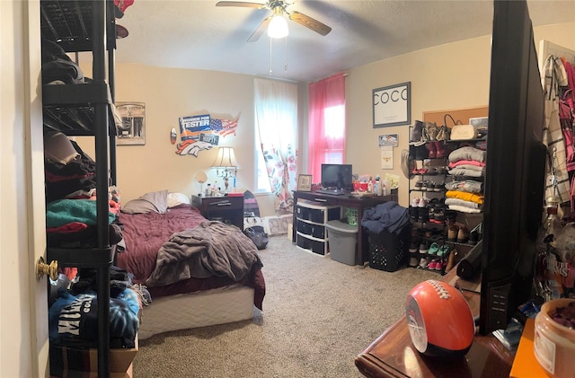 bedroom featuring carpet floors and a ceiling fan