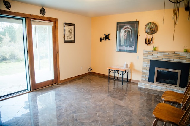 3676 Silverthorn Dr, Stevensville, MT 59870 - living room with baseboards and a fireplace