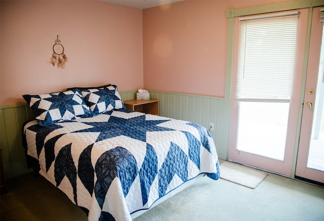 3676 Silverthorn Dr, Stevensville, MT 59870 - bedroom featuring wainscoting and carpet floors