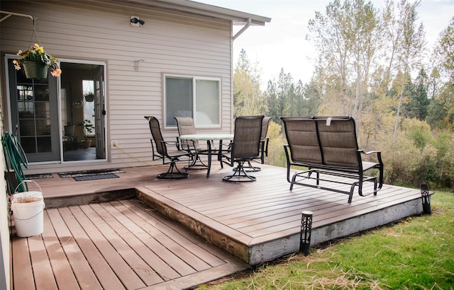 3676 Silverthorn Dr, Stevensville, MT 59870 - wooden deck featuring outdoor dining space