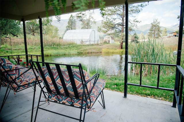 3676 Silverthorn Dr, Stevensville, MT 59870 - view of patio with a water and mountain view