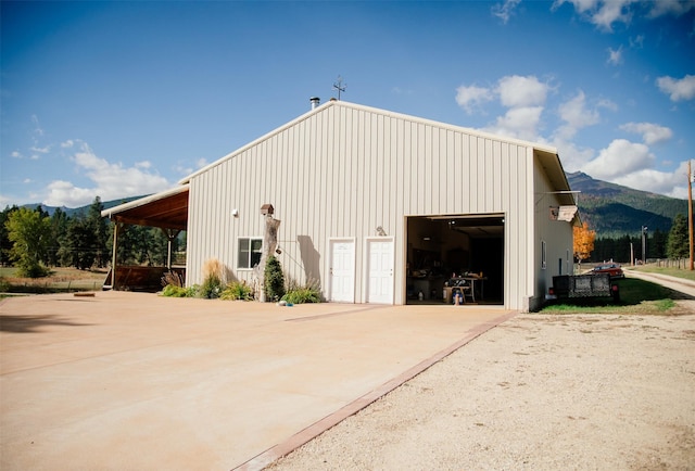 3676 Silverthorn Dr, Stevensville, MT 59870 - view of outbuilding featuring a mountain view and concrete driveway